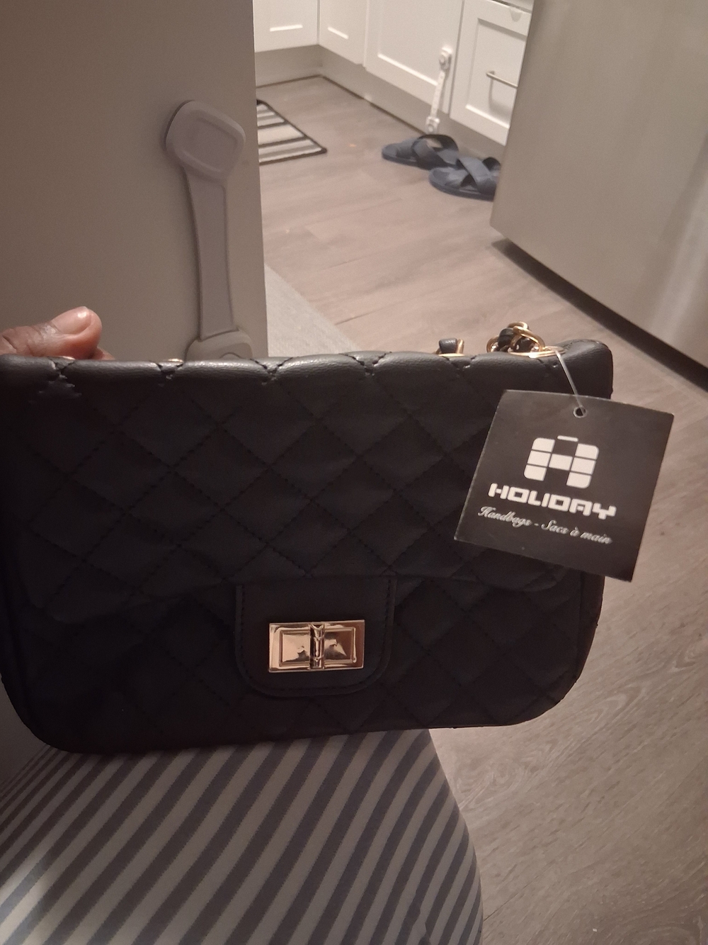 Black Quilted Crossbody Bag with Gold Turn-Lock